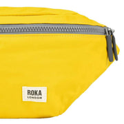 Roka Jubilee Medium Recycled Nylon Sling Bag - Mustard Yellow